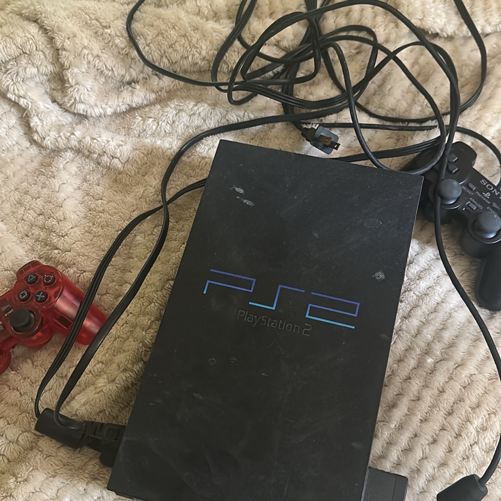 Sony PS2 Console with Red and Black Controllers